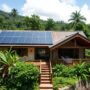 Sustainable eco lodge in Costa Rica rainforest with solar panels and natural building materials